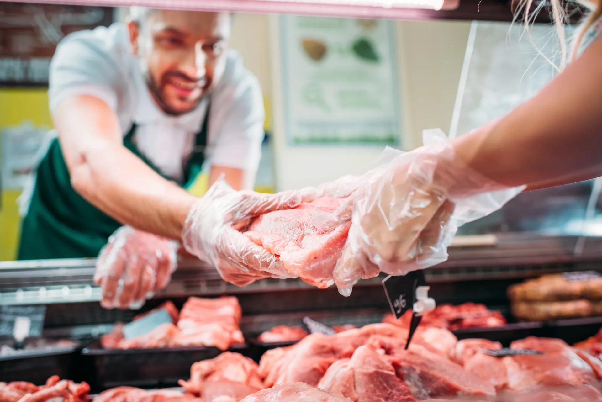 Butcher working with meat from Meatbid